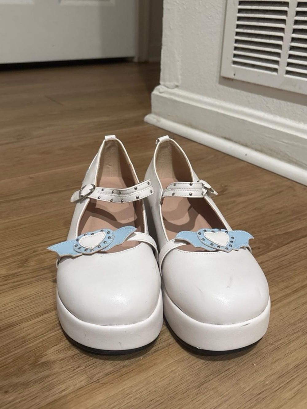 White womans Mary Jane Shoes with Blue Heart Accent